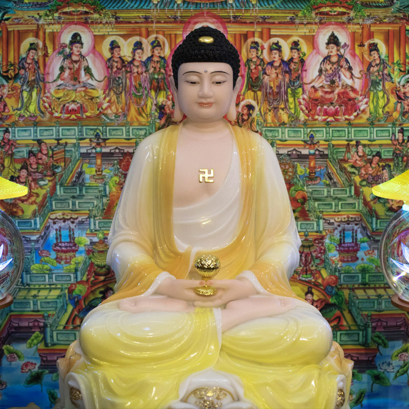 Tượng Phật A Di Đà ngồi đài sn màu vàng nhạt